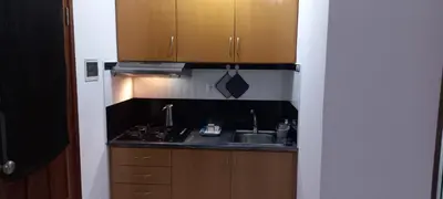 a small kitchen with a sink and a stove at Ka-Bela 2 in Sal Rei