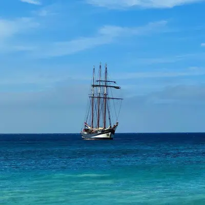 a boat in the ocean on the water at Albis Harena - Meridiana Private Apartment Ocean View in Santa Maria