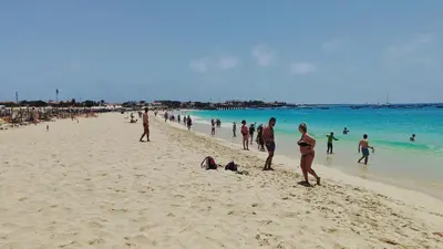 a group of people standing on a beach at Albis Harena - Meridiana Private Apartment Ocean View in Santa Maria