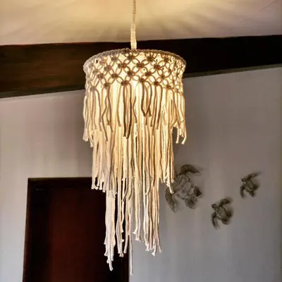 a chandelier hanging from a ceiling in a room at Solstice in Santa Maria