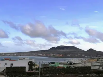 a view of a city and a body of water at Villa Calhau in Mindelo