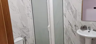 a bathroom with a shower and a sink at PIMONTAPARTMENTS in Espargos