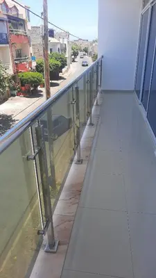 a balcony of a building with a view of a street at My Flat 2 in Praia