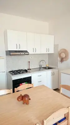 a toy elephant sitting on top of a table in a kitchen at Residence Estrela do Mar in Sal Rei