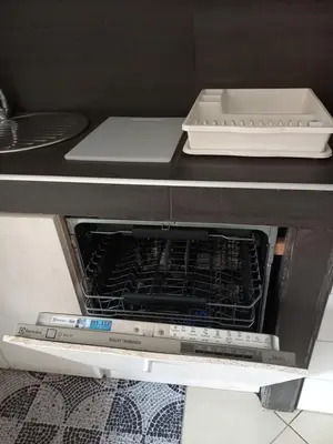 an oven with its door open in a kitchen at MORADIAS I02/C in Prainha
