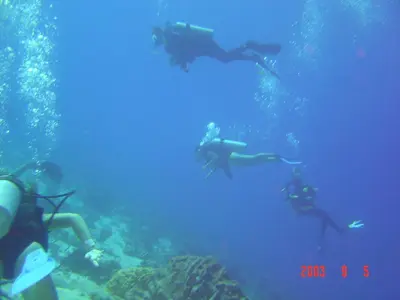 a group of people swimming in the ocean at Foya Branca by Flagworld Hotels in São Pedro