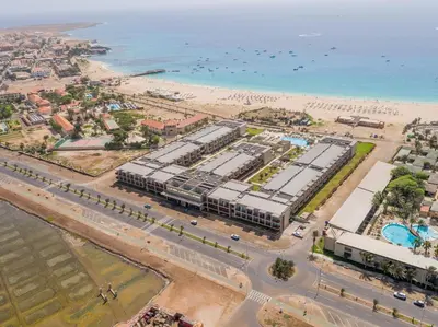 an aerial view of a beach and the ocean at Oasis Salinas Sea in Santa Maria