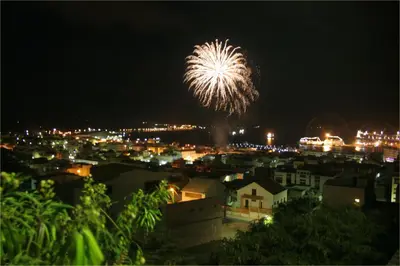a fireworks display over a city at night at Solar Windelo in Mindelo