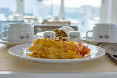 a plate of food on top of a table at Ouril Mindelo in Mindelo
