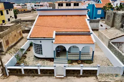 an overhead view of a house with an orange roof at Djon’s place in Baia das Gatas