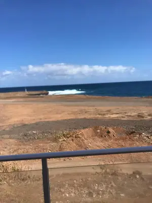 a view of a beach with the ocean in the background at Casa Andrade Delgado - Rocha Grande in Ponta do Sol