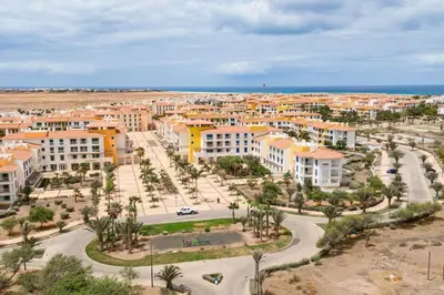 an aerial view of a city with palm trees and buildings at Sol & Lar No stress in Santa Maria