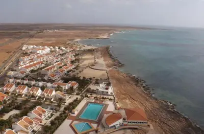 an aerial view of a resort near the ocean at Vila Paradise Sea & Swimming Pool View in Beirona