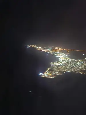 an aerial view of a city at night at Soleil Beach House in Santa Maria