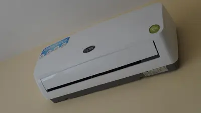 a printer sitting on top of a wall at Beauty Plaza Suites in Santa Maria