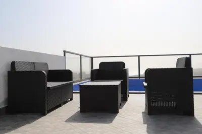 a row of chairs sitting on top of a building at Maison da Praia in Praia