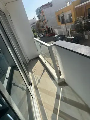 an outside view of a balcony of a building at Appartement cosy et spacieux in Praia
