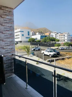 a balcony with a view of a parking lot at COSEC Tours in Cova Figueira