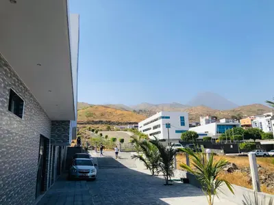 a view of a street in a city with buildings at COSEC Tours in Cova Figueira