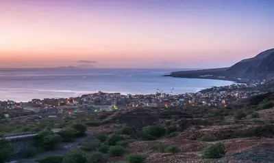 a city on a hill next to the ocean at TARRAFAL SN TOUR in Tarrafal