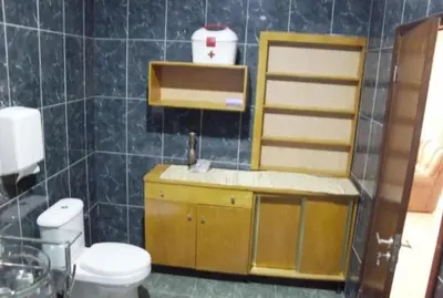 a bathroom with a sink and a toilet in it at T1 conforto in Praia