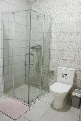 a bathroom with a shower and a toilet at WEYt1 in Sal Rei