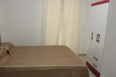 a bedroom with a bed and a dresser at WEYt1 in Sal Rei