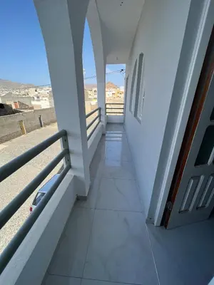 a hallway of a house with a view of the desert at Brand new apartment in Mindelo in Mindelo