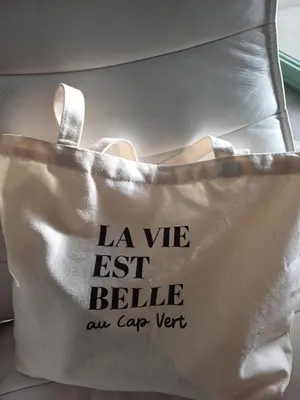 a tote bag that says la we best believe an car year at Casa Verde in Santa Maria