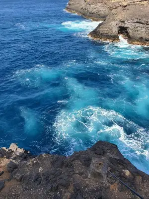 a view of the ocean with blue water and rocks at Casa Verde in Santa Maria
