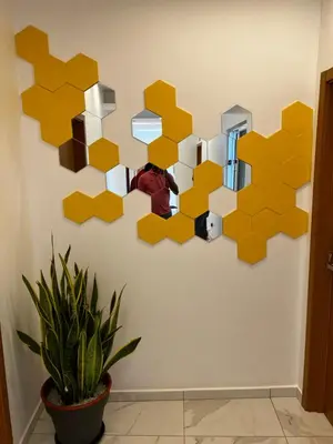 a wall with yellow and white squares on a wall at Pensão Gonçalves in Calheta de São Miguel