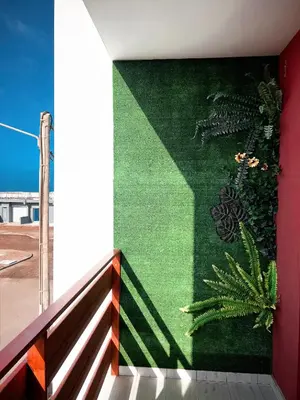 a mural on the side of a building at P&SApartments in Santa Maria