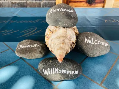 a pile of rocks sitting on top of a table at Get house kira in Cidade Velha