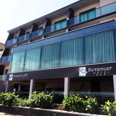 a building with a sign for a hotel at Beramar Hotel in Praia