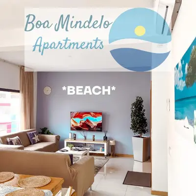 a living room with a couch and a table at Boa Mindelo Beach in Mindelo
