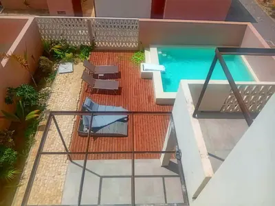 an overhead view of a swimming pool on a house at Vila Cristina Alojamento, Praia Estoril, Boa Vista in Sal Rei