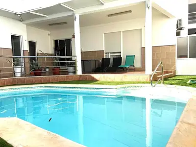 a swimming pool in front of a house at wonder of the archipelago in Praia