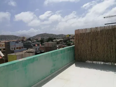 a view of a city from the roof of a building at STUDIO VUE MER - CASA da LUZ in Mindelo