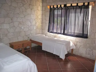a room with two beds and a window at Villa 4 Stella Maris - Ilha do Maio in Vila do Maio