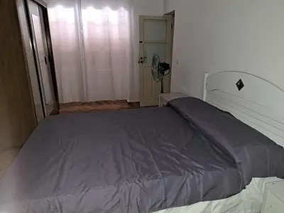 a bedroom with a large bed in a room at Casa Nostra in Sal Rei