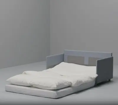 a bed in a white room with white sheets at Charming House Tarrafal in Tarrafal