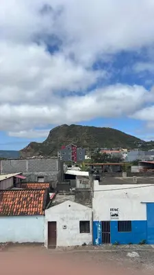 a group of buildings with a mountain in the background at Casa Tota in Assomada