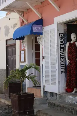 a store front with a mannequin in a window at Hotel MiraBela in Santa Maria