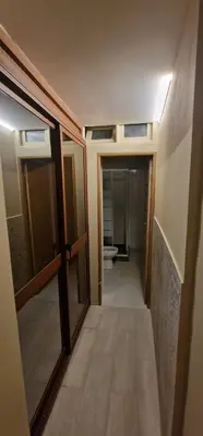 an empty hallway with a toilet in a room at City Center Mindelo 37 in Mindelo