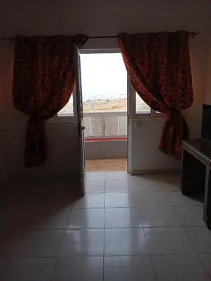 an open door in a room with a window at Edu Horizonte in Calheta de São Miguel