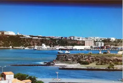 a view of a body of water with a city at Gamboa Djeu in Praia