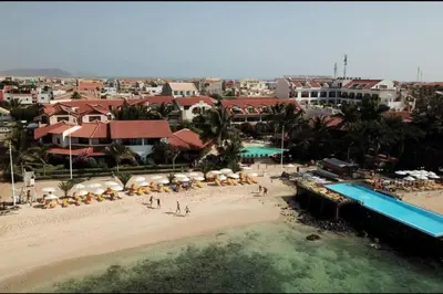 an aerial view of a beach with a resort at Oceanfront Apt 25 Porto Antigo II in Santa Maria