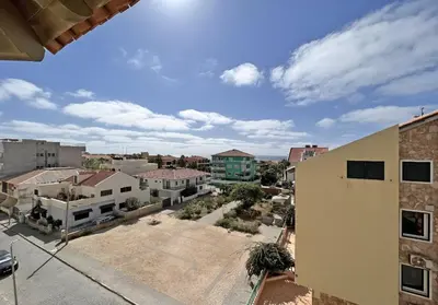 an aerial view of a city with buildings at Bright Top Floor with Terrace in Santa Maria