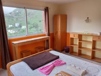 a small bedroom with a bed and a window at SANDRO Paul Residenciel in Paul