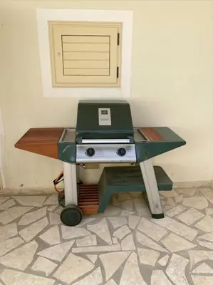 a desk with a computer on top of it at Surf House - Your Exclusive Getaway in Palmeira